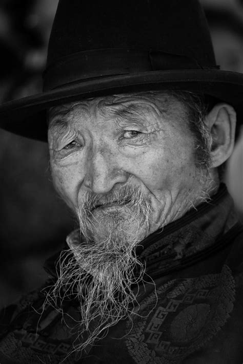 Old Man Reading A Book Mongolia